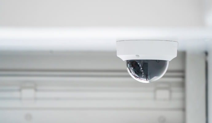 An installed home security system on the ceiling